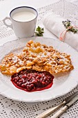 Funnel cake with lingonberry compote