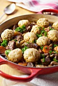 Beef casserole with dumplings and carrots