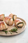Scallops wrapped in courgette and bacon
