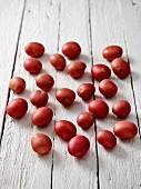 Red potatoes on a wooden surface