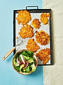 Carrot and pumpkin fritters with a salad