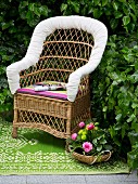 DIY - wicker armchair with seat cushion and white cushioned backrest edge