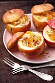 Baked apples with millet, dried apricots, almonds and honey