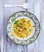 Millet and vegetable soup with chives