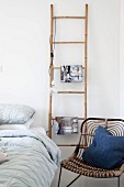 Bamboo ladder used as bedside table