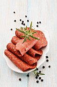 Slices of veggie pepper salami based on protein