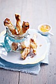 Puff pastry sticks with cinnamon and orange marmelade