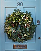 Advent wreath on blue front door