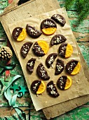 Candied oranges with chocolate glaze and coconut