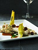 Cod fillet with a prawn salad, mushrooms and baby fennel