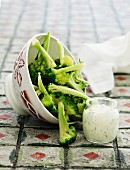 Broccoli florets with a herb dip