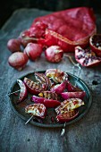 Grilled red onions with pomegranate molasses