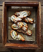 Pistachio bread plaits with sugar nibs