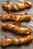 Pizza sticks filled with salami, cheese and tomato sauce