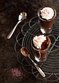 Chocolate cream deserts with whipped cream