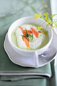 Avocado foam soup with salmon
