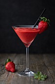 Strawberry daiquiri in a stemmed glass