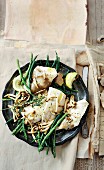 Grilled fish with mushrooms and tarragon butter