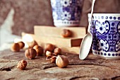 Coffee cups and hazelnuts
