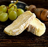 Brie de meaux with grapes and a cheese knife