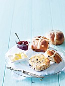 Hot cross buns with butter and jam