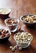 Different kinds of nuts in bowls