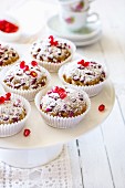 Pomegranate muffins with icing sugar
