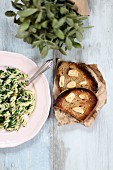 Pasta with spinach, and garlic bread