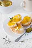 Slices of bread with lemon rosemary marmalade