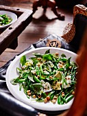 Salad with baby spinach and hazelnuts