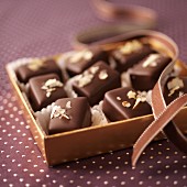 Chocolate and nut pralines in a gift box