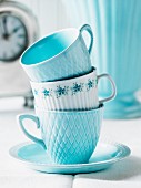 Stacked blue and white teacups
