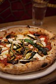 New York style pizza with courgettes and mozzarella
