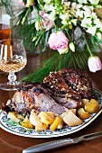 Leg of lamb with a rosemary marinade and potatoes