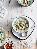Dovga (yoghurt and herb soup from Azerbaijan) with chilli flakes