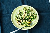 Cucumber salad with spring onions and peanuts (Asia)