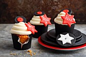 Carrot cupcakes with rock 'n' roll decorations
