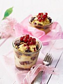 Chocolate cheesecake with redcurrants in glasses as gifts