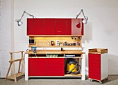 DIY workbench and chest of drawers on castors with red fronts