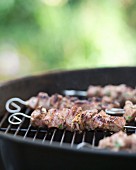 Grilled lamb kebabs on a barbecue