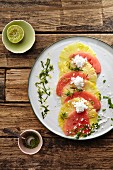 Watermelon and pineapple carpaccio with grated coconut, lime and mint