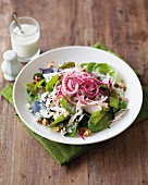 Spinach salad with blue cheese, chicken, walnuts and onions