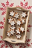 Cinnamon stars on a wooden tray