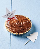 Chocolate and coconut tart as a gift