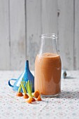 A cocoa and carrot smoothie with bananas