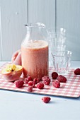Sweet lupine smoothies with raspberries and peach