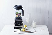 A blender and kitchen utensils for making smoothies