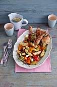 Chicken legs with oven-roasted vegetables