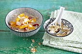 Coconut rice pudding with goji berries and mango