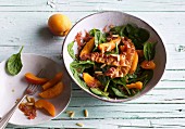 Spinach and apricot salad with fried bacon